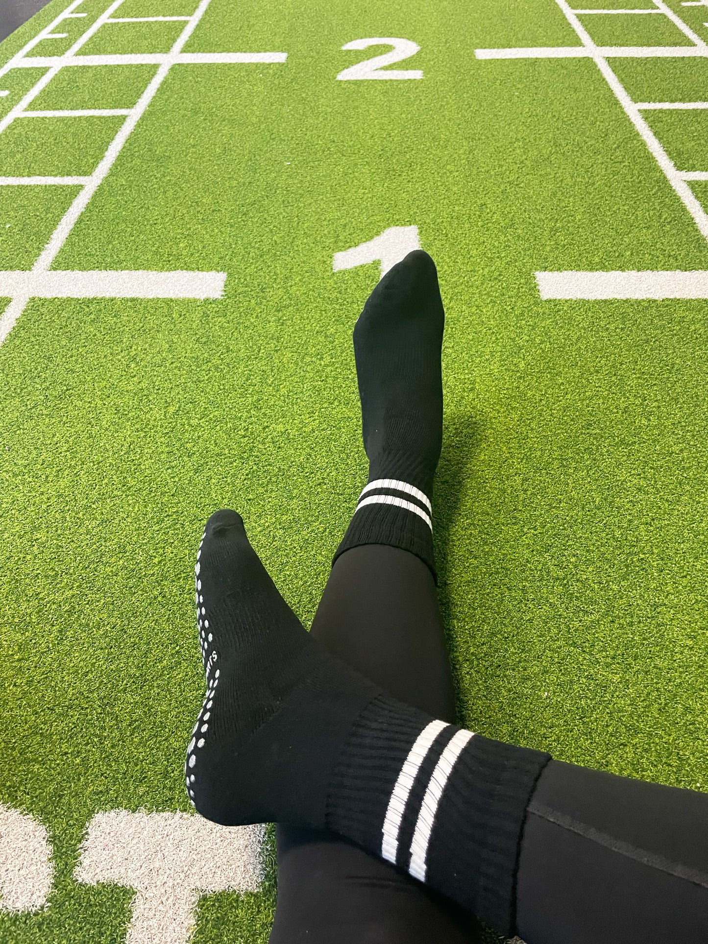 Sport socks with silicone grips