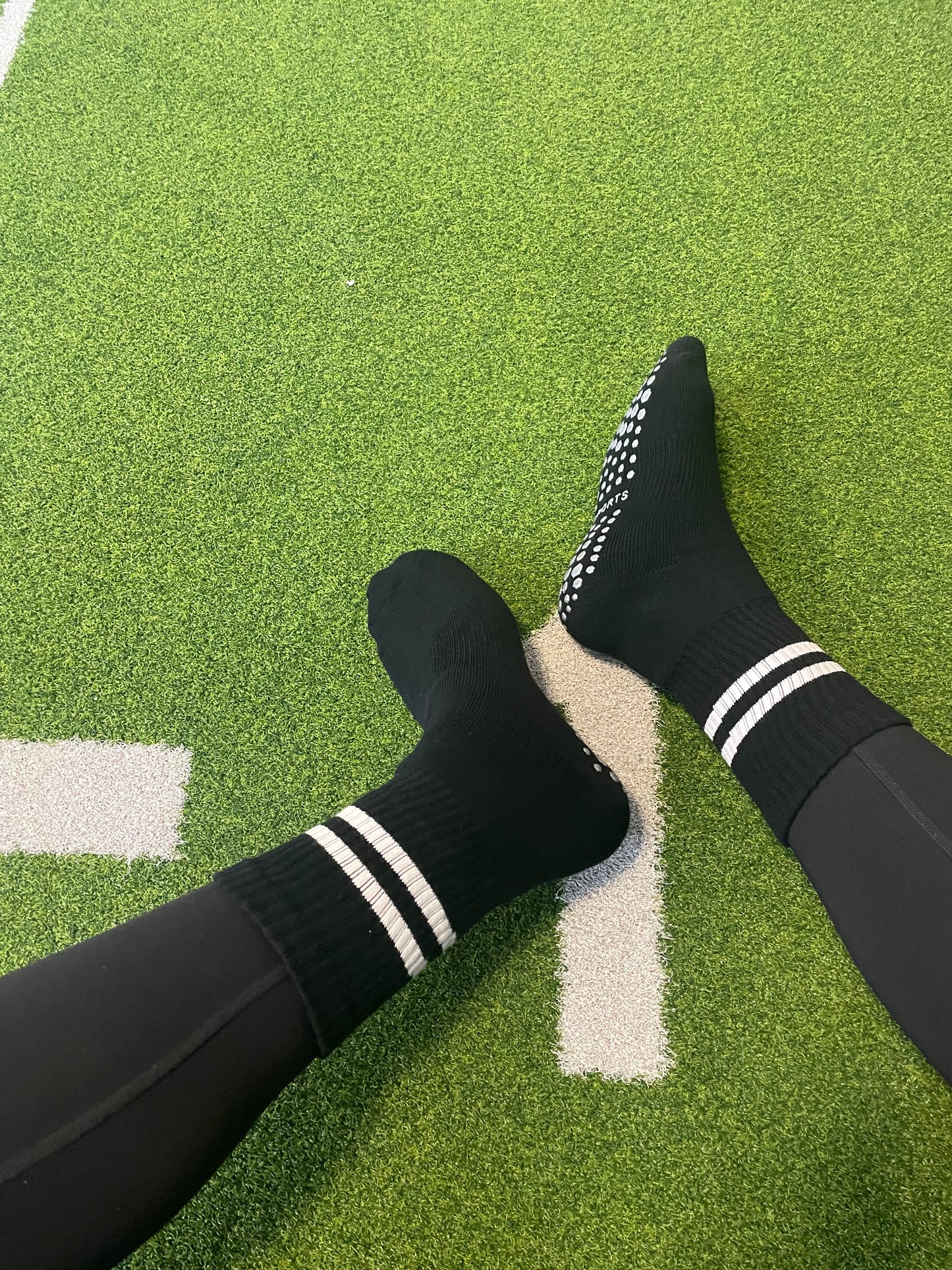 Sport socks with silicone grips