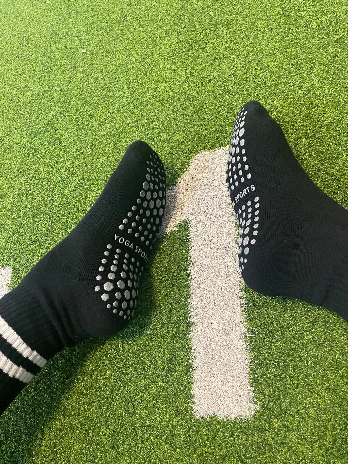 Sport socks with silicone grips